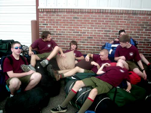 After unloading the bus, some of us decided to relax on the luggage while we waited for someone to open the snow shelter.