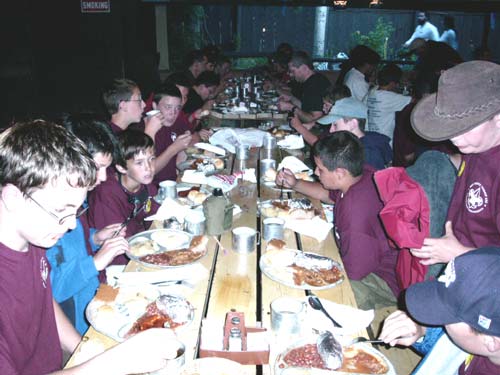 The scouts enjoyed the food so much that they didn't even bother looking at the camera.